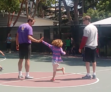 High five at camp — Coach Dave with young player